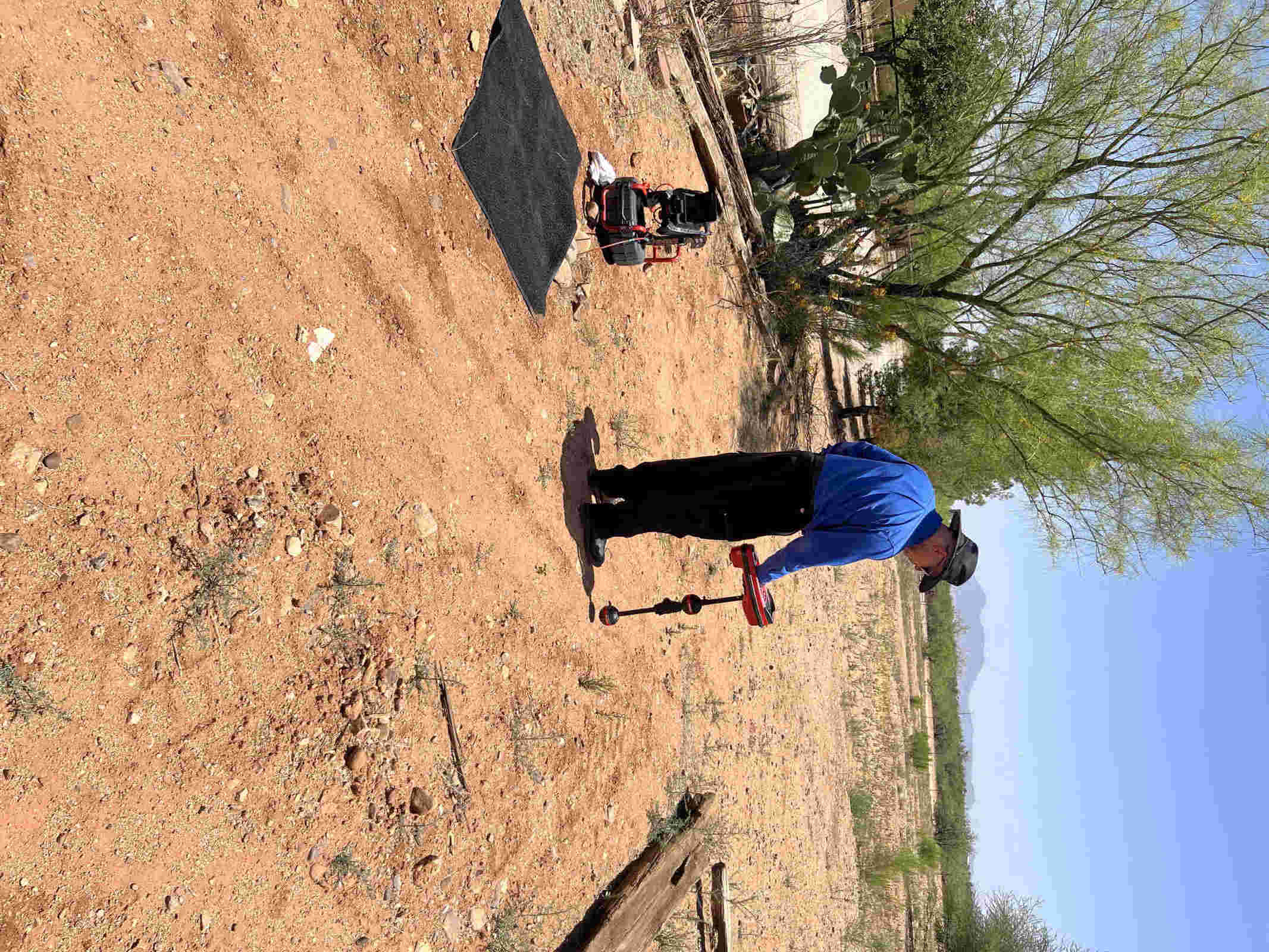 Sewer camera locator equipment marking a problem spot at the surface